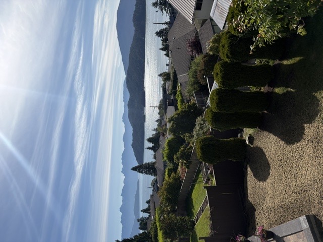 Gibsons residential view over rooftops, trees, and the water