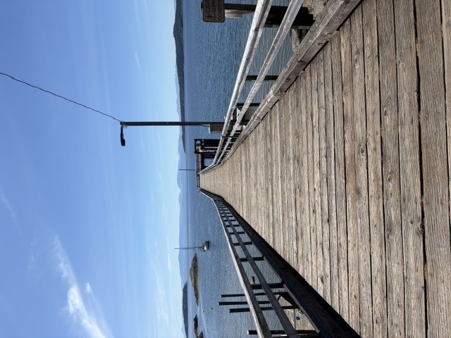 Halfmoon Bay government dock and blue water